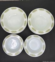 Stacked cereal bowls and fruit dishes showing pattern