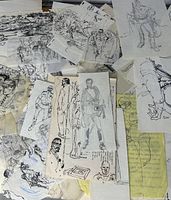 spread of multiple loose illustration sketches on various paper types, figures and scene studies visible