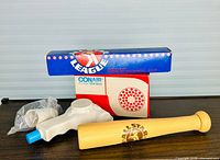 Hair dryer, bat shampoo bottle, Conair box