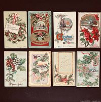 Fronts of all eight postcards displayed