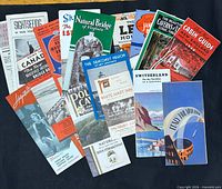 Group shot of all brochures fanned out showing variety and front covers