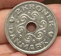 Reverse with swirl motif, denomination and country name