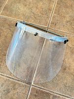 Front view of aluminum bracket and visor