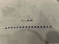 Full bracelet and extender laid flat showing stone pattern