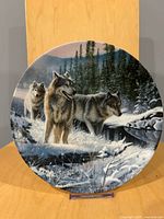 Front of plate showing wolf artwork