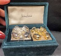 Open velvet box showing both shakers and Neiman Marcus lining