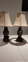 Both table lamps standing side by side showing complete view with shades