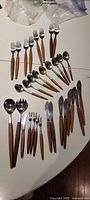 Full layout of all cutlery pieces on table