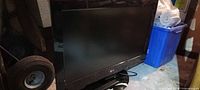 Front view of LG 32" flat panel TV on stand