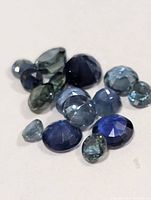 All loose sapphires spread on neutral background