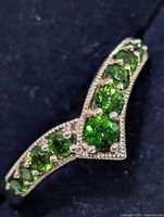 Front view showing V-shape and chrome diopside stones
