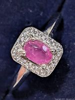 Front view of ruby halo ring