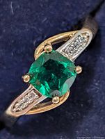 Front view showing chrome diopside center and accent stones