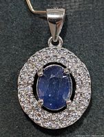 front view showing sapphire centre and CZ halo