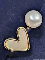 Close-up of heart mother-of-pearl and pearl elements