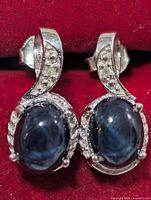 front view showing sapphires and accent stones