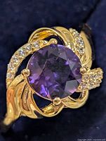 Top view showing amethyst center and CZ accents