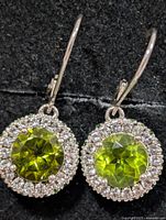 Front view showing peridot centres and chrome diopside halo