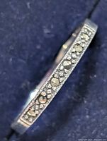 Close-up of marcasite stones set in silver band