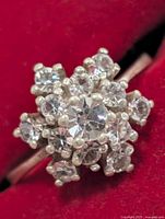 Top view showing cluster of clear stones in silver setting