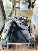 Stroller folded flat on deck