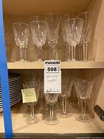 Cabinet shelf of Waterford Lismore stemware groups