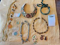 Full view of all jewellery pieces on cloth background