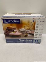 Front of box showing Anchor Hocking Oven Basics branding and illustration of glass bakeware pieces