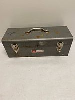 Closed gray Craftsman steel toolbox top view showing handle and latches