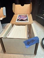 Box of stacked baseball cards with Steve Finley card on top
