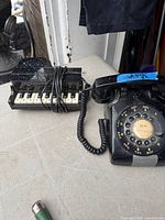 Both telephones side by side on table