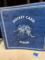 Front cover of blue Hockey Card Album