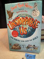 Front cover showing title, author, illustrator, globe graphic