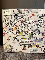 Front of Led Zeppelin III album showing artwork, catalog number SD 7201