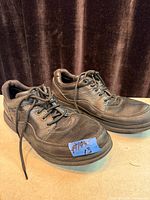 Overall view of both shoes showing uppers, laces and general condition