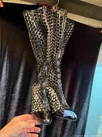 Full front view of both boots hanging