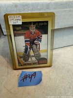 Front view of 1987-88 O-Pee-Chee Patrick Roy card in protective sleeve