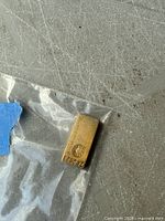 Front of bar showing brand, emblem and serial