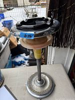 Full view showing chrome base, ribbed stem, onyx-look collar, glass ashtray