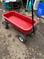 Full view of red Radio Flyer Classic ATW wagon showing tires and handle