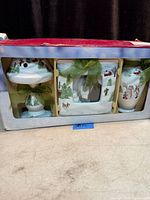 Boxed winter scene gift set showing vase, picture frame and tea lamp