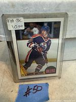 Front view of 1987-88 O-Pee-Chee Wayne Gretzky card in sleeve