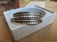 Bracelet resting in padded presentation box