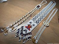 Overall view of all three beaded accessories laid out on table