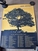 Full view of Jack Johnson tour poster front showing tree graphic and text