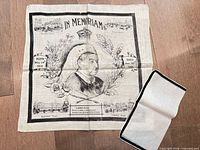 Full view of both handkerchiefs laid flat on floor