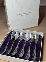 Six sterling teaspoons in velvet-lined box