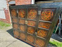Front view showing painted panels, doors and drawers