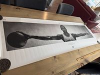 Full view of Michael Jordan Wings poster laid flat on table