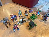 Assorted TMNT action figures displayed on table